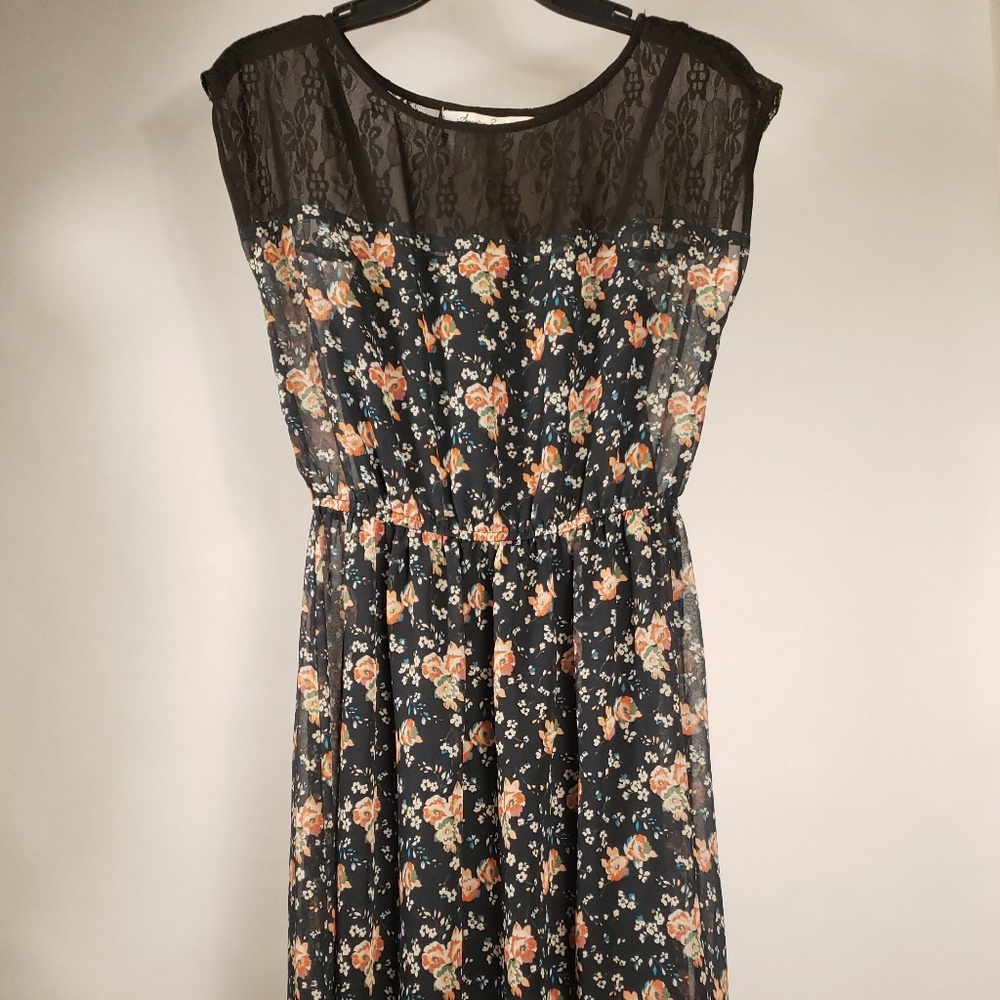 New. Not worn. Black. Floral. High low. Dress